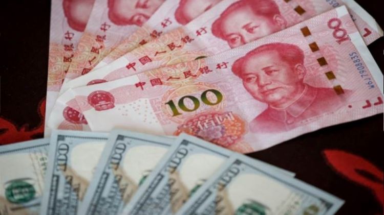 Yuan hits lowest level against dollar since 2007
